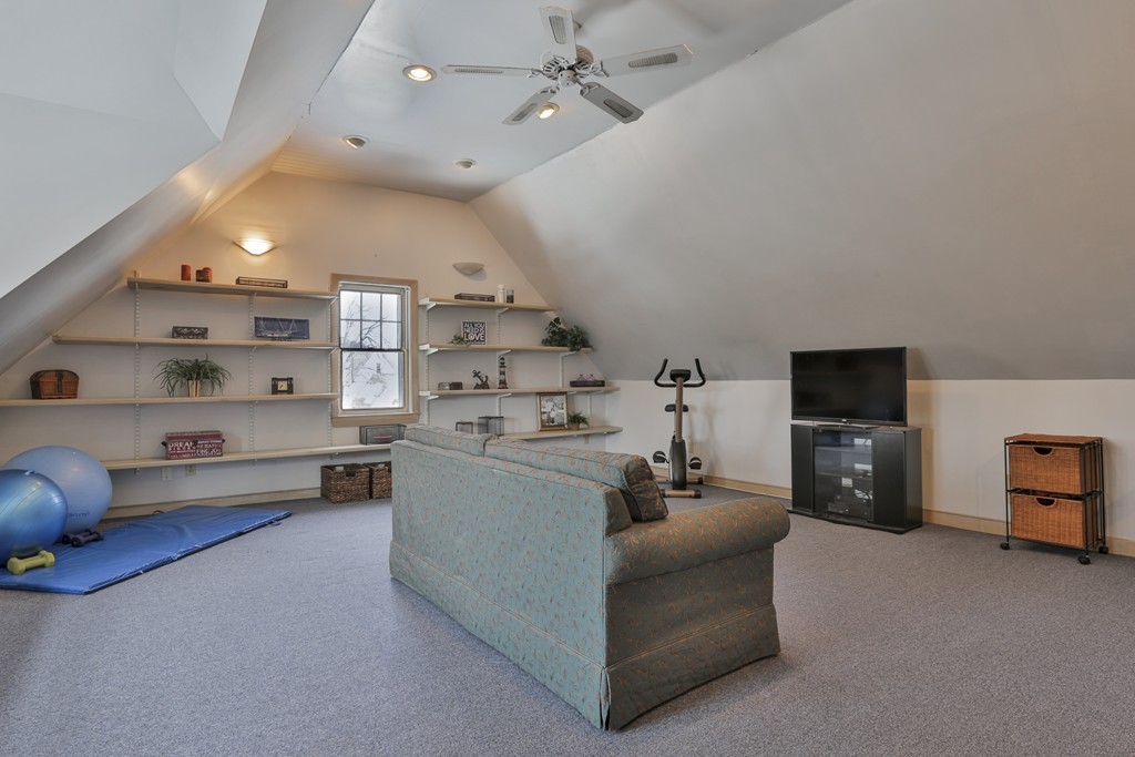 1 Carleton Road Groveland, MA 01834 - Photo 30 of 30 a living room with furniture and a flat screen tv