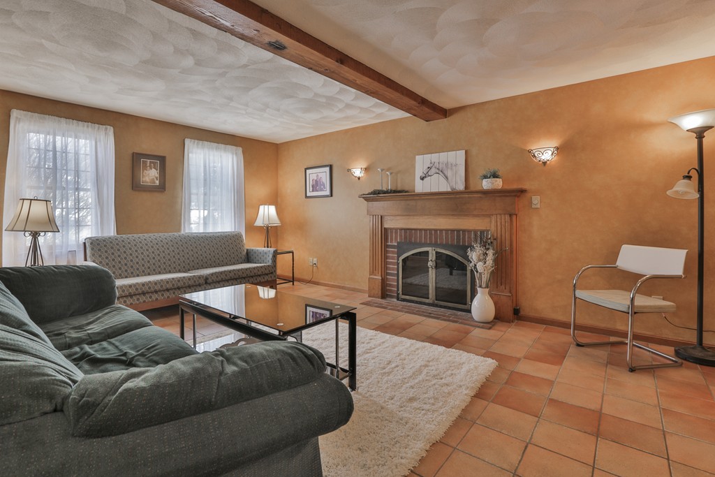 1 Carleton Road Groveland, MA 01834 - Photo 5 of 30 a living room with furniture and a fireplace