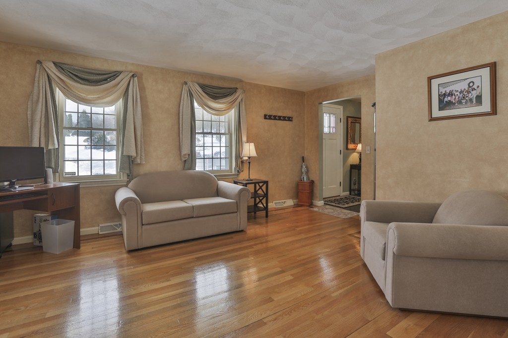 1 Carleton Road Groveland, MA 01834 - Photo 7 of 30 a living room with furniture and a large window
