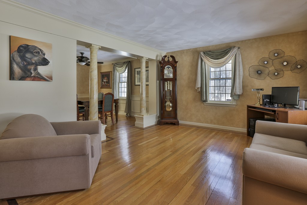 1 Carleton Road Groveland, MA 01834 - Photo 8 of 30 a living room with furniture and a flat screen tv
