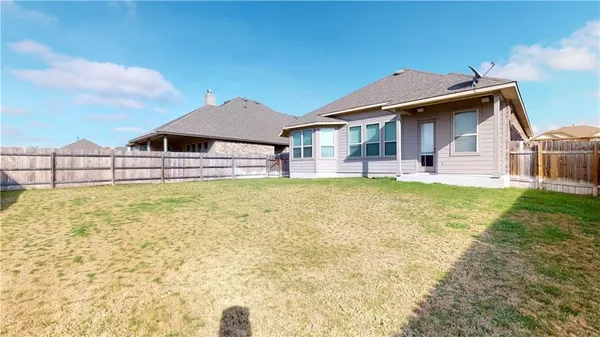a house view with a outdoor space