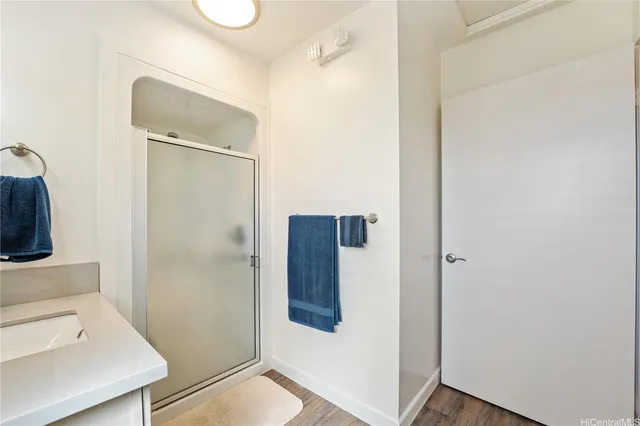 a bathroom with a sink and mirror