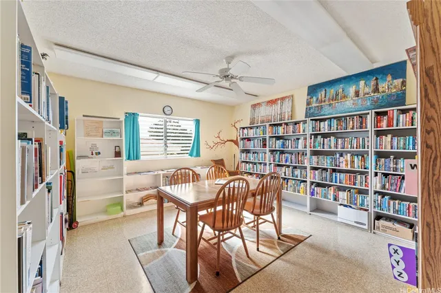 a living room with lots of furniture and a table