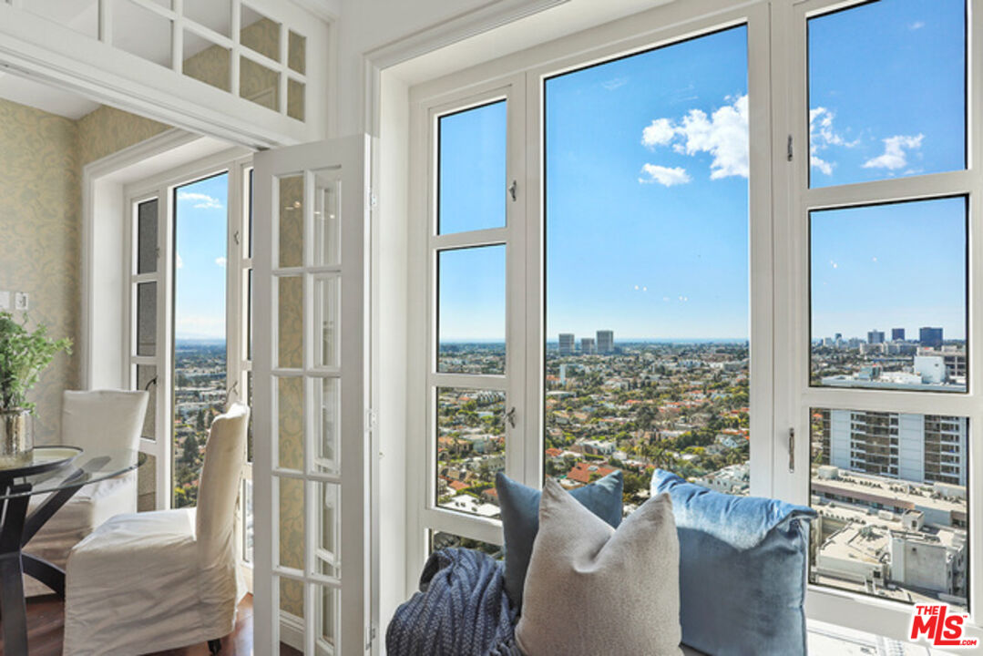 a view of living room and dining room