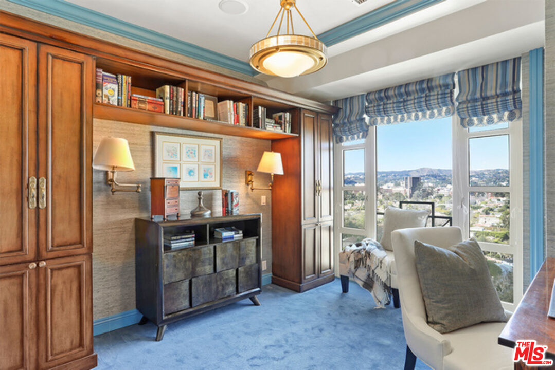 10580 Wilshire Boulevard, Unit 19NW Los Angeles, CA 90024 - Photo 12 of 20 a view of living room filled with furniture and window