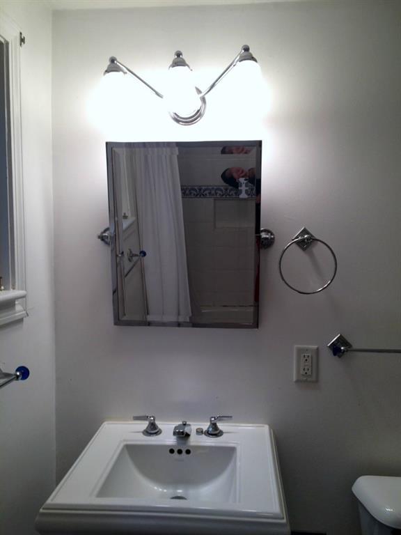 106 Main Street, Unit R Kennebunkport, ME 04046 - Photo 10 of 29 Bathroom sink - blue tiled flooring,...