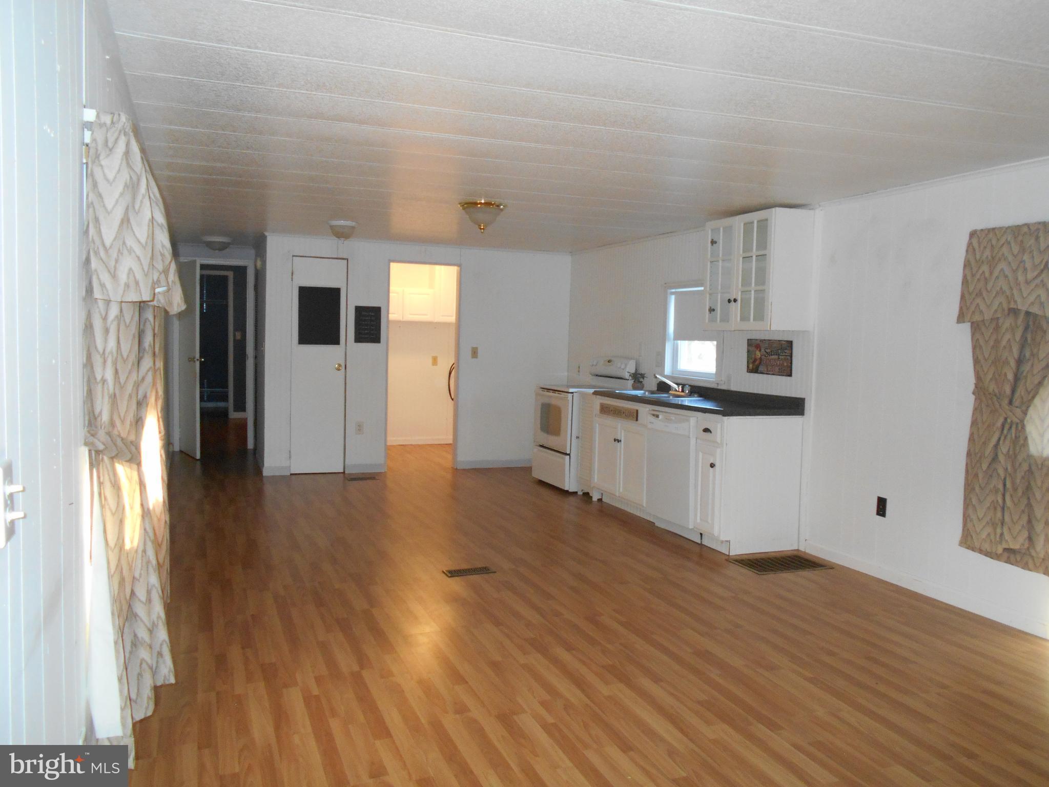 5030 Mt Zion Road Hurlock, MD 21643 - Photo 9 of 15 Living Room/Kitchen