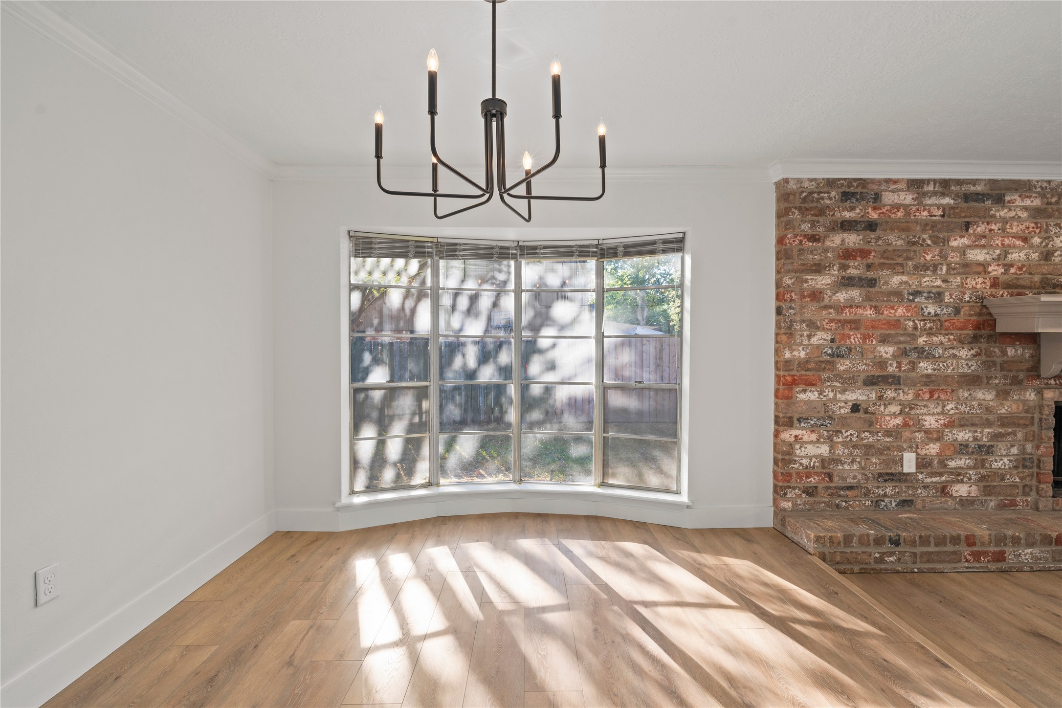 19415 Enchanted Oaks Drive Spring, TX 77388 - Photo 15 of 48 a view of empty room with wooden floor and fan