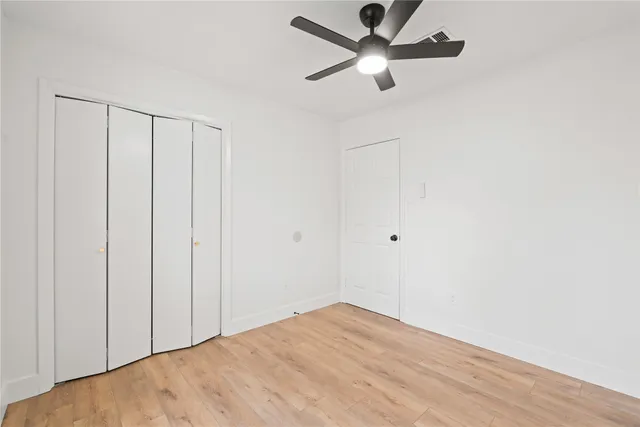 a view of a big room with carpet