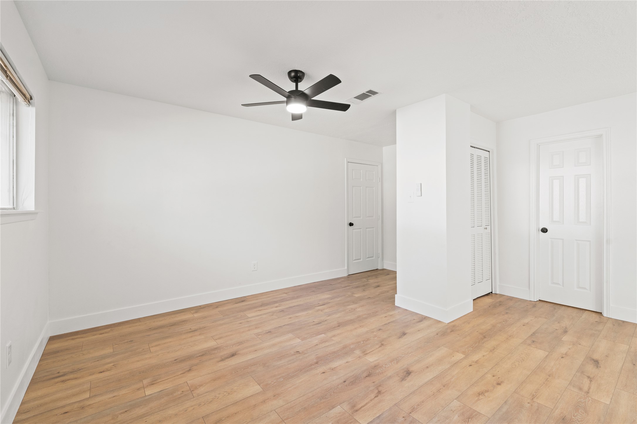 19415 Enchanted Oaks Drive Spring, TX 77388 - Photo 38 of 48 a view of empty room with wooden floor