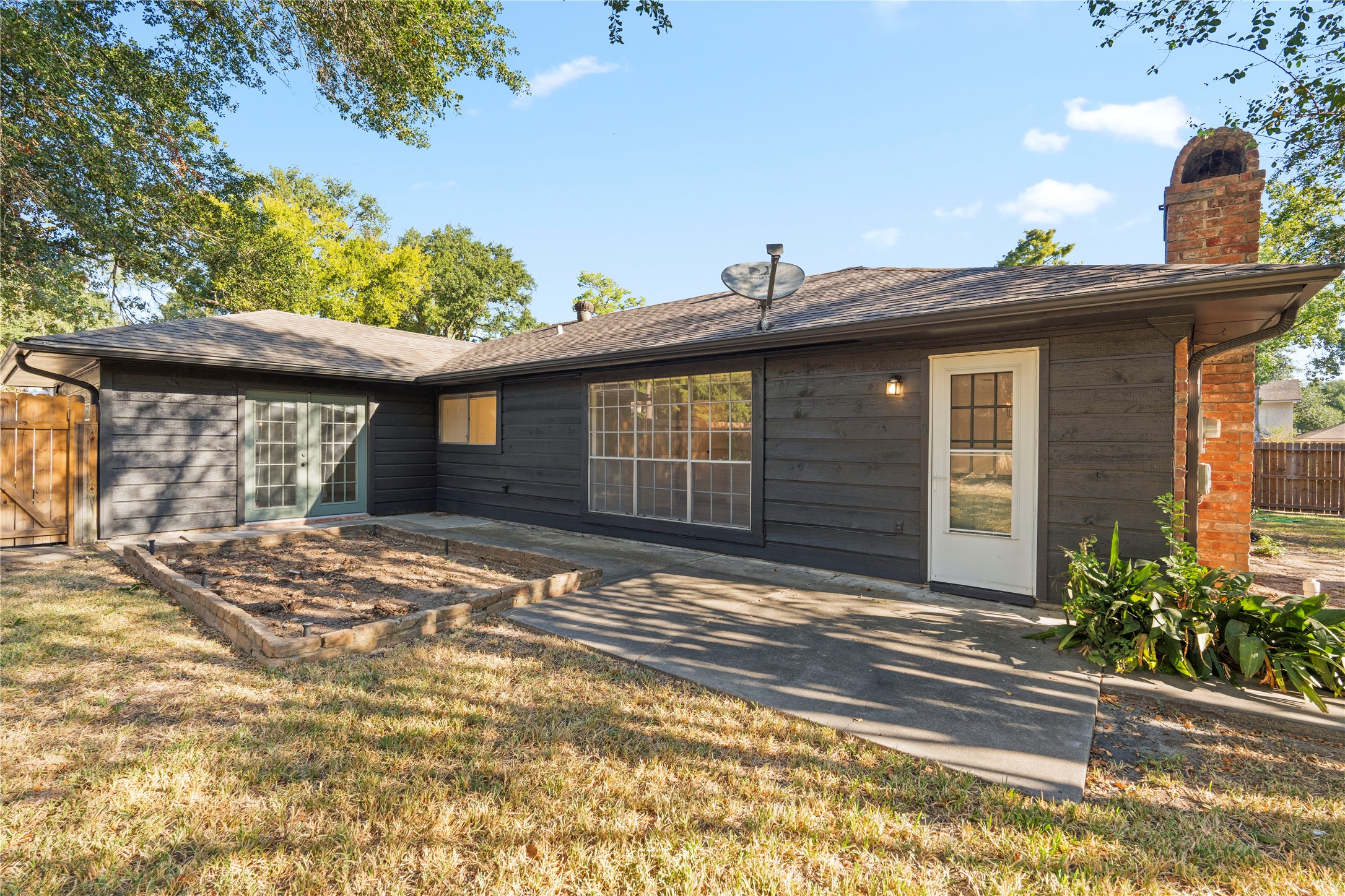 19415 Enchanted Oaks Drive Spring, TX 77388 - Photo 43 of 48 a view of a house with a patio