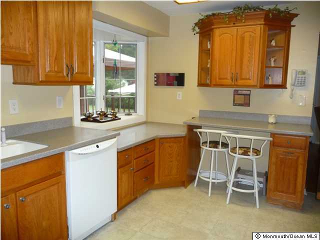 708 Cassville Road Jackson, NJ 08527 - Photo 3 of 3 a kitchen with a sink cabinets and window