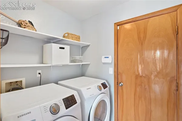 a utility room with dryer and washer