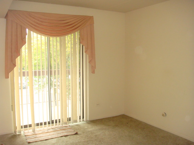 6443 Clarendon Hills Road, Unit 202 Willowbrook, IL 60527 - Photo 12 of 18 a view of a room with a large window