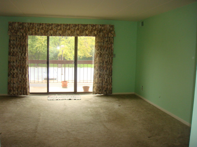 6443 Clarendon Hills Road, Unit 202 Willowbrook, IL 60527 - Photo 3 of 18 a view of an empty room with a window