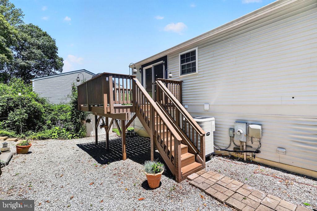 8471 Great Lake Lane Springfield, VA 22153 - Photo 38 of 65 a view of deck with patio