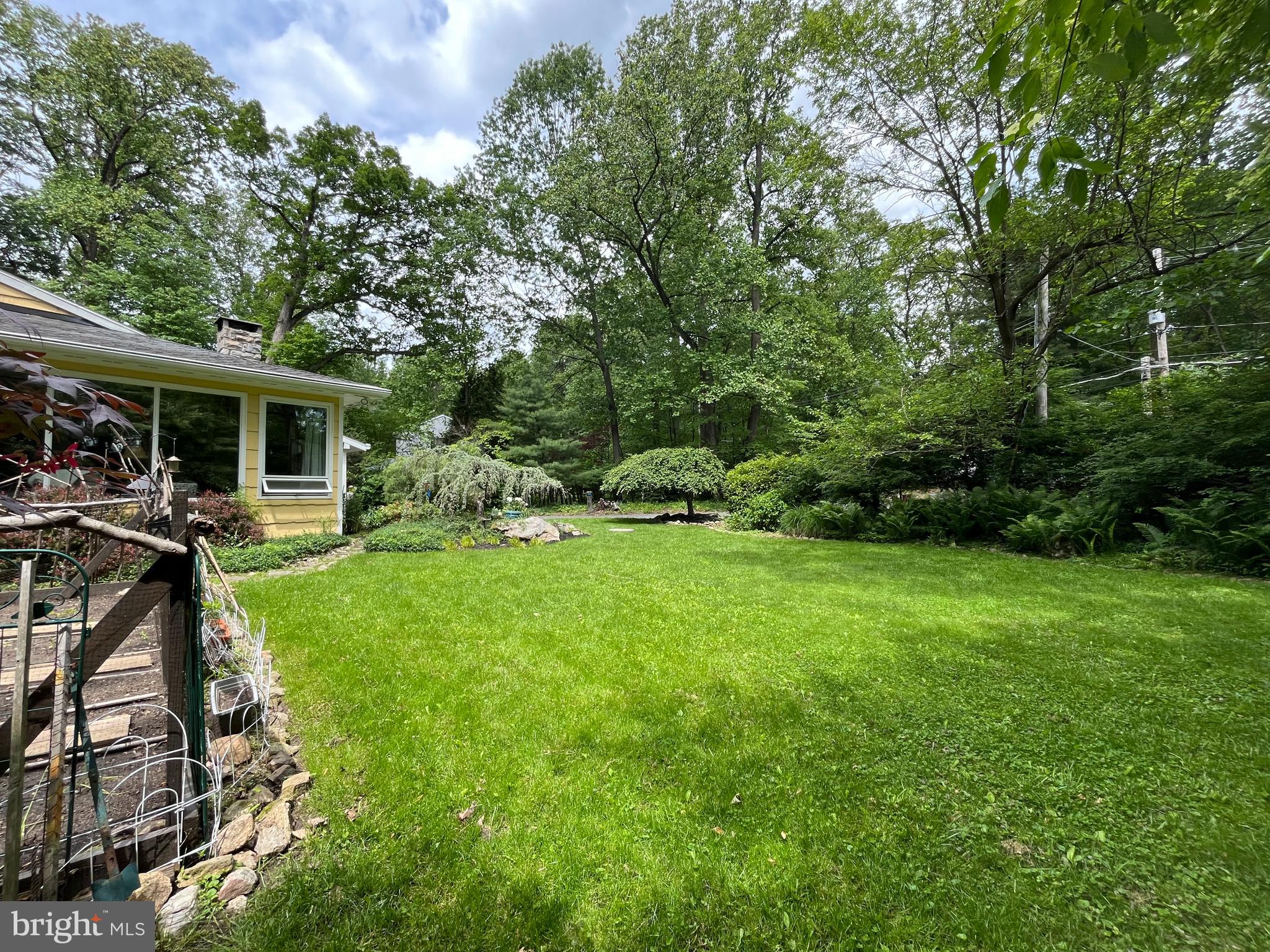 212 Haag Road Reading, PA 19606 - Photo 35 of 56 a view of a house with backyard patio and garden
