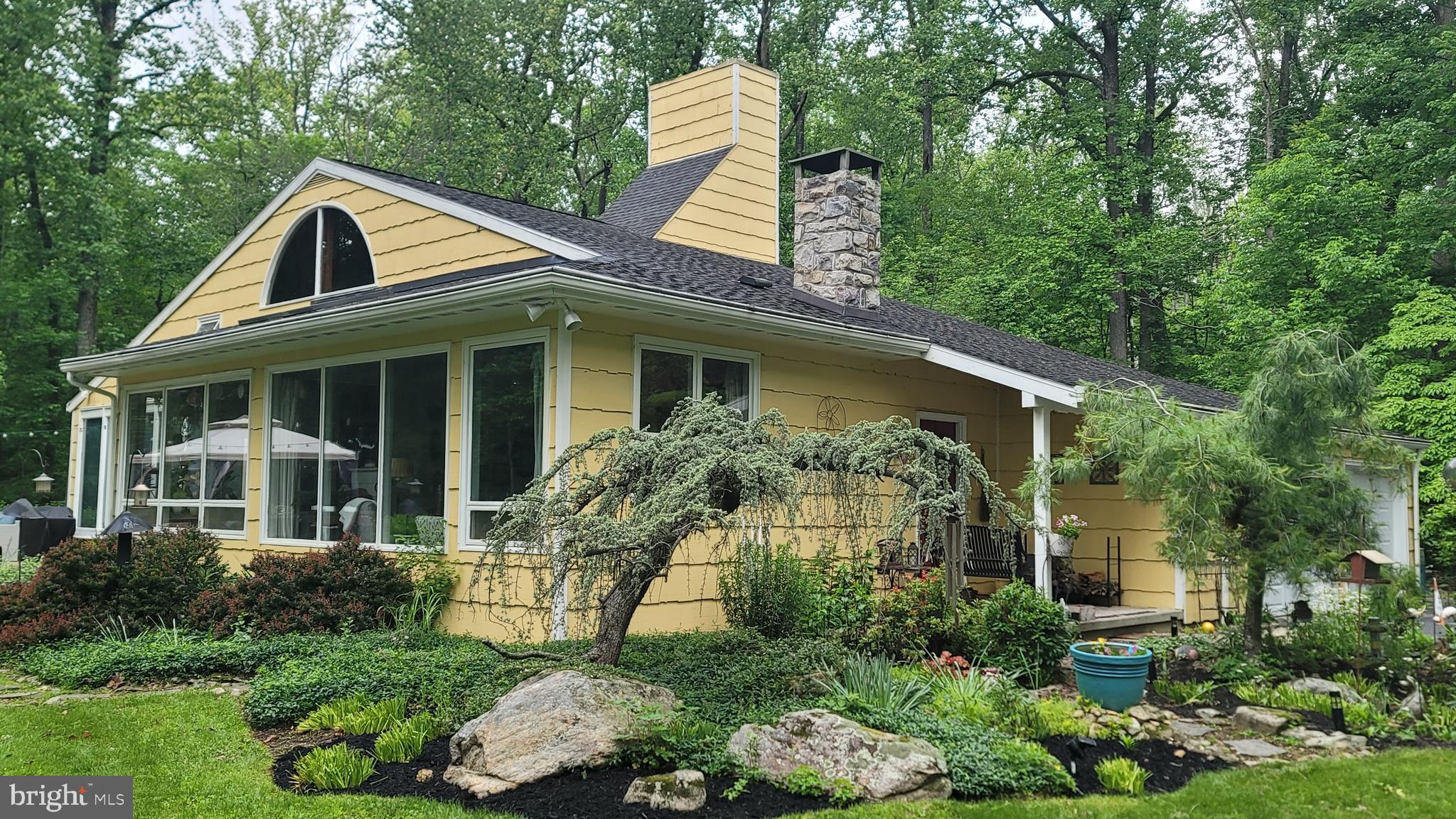 212 Haag Road Reading, PA 19606 - Photo 36 of 56 a front view of a house with a yard and potted plants