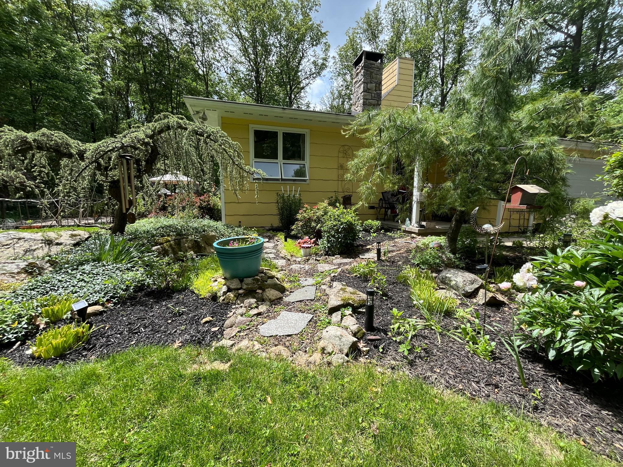 212 Haag Road Reading, PA 19606 - Photo 37 of 56 a view of a house with a yard and garden