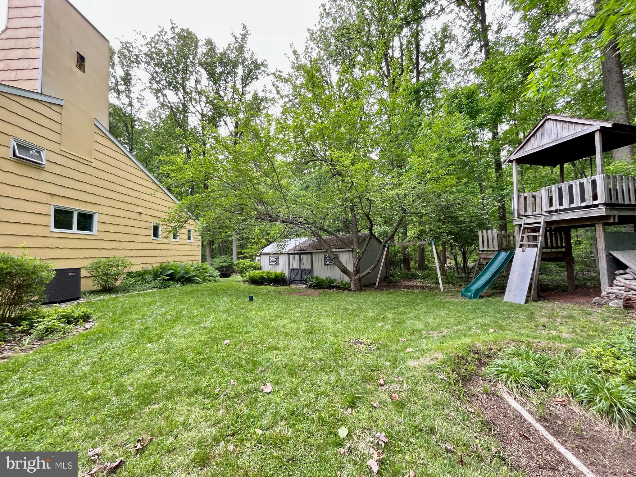 212 Haag Road Reading, PA 19606 - Photo 41 of 56 a view of a house with a yard and sitting area