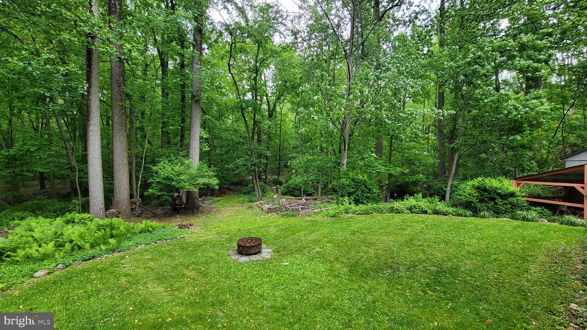 212 Haag Road Reading, PA 19606 - Photo 43 of 56 a view of an house with backyard space and garden