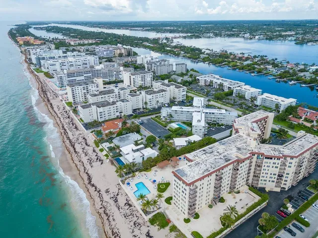 an aerial view of a house with a garden