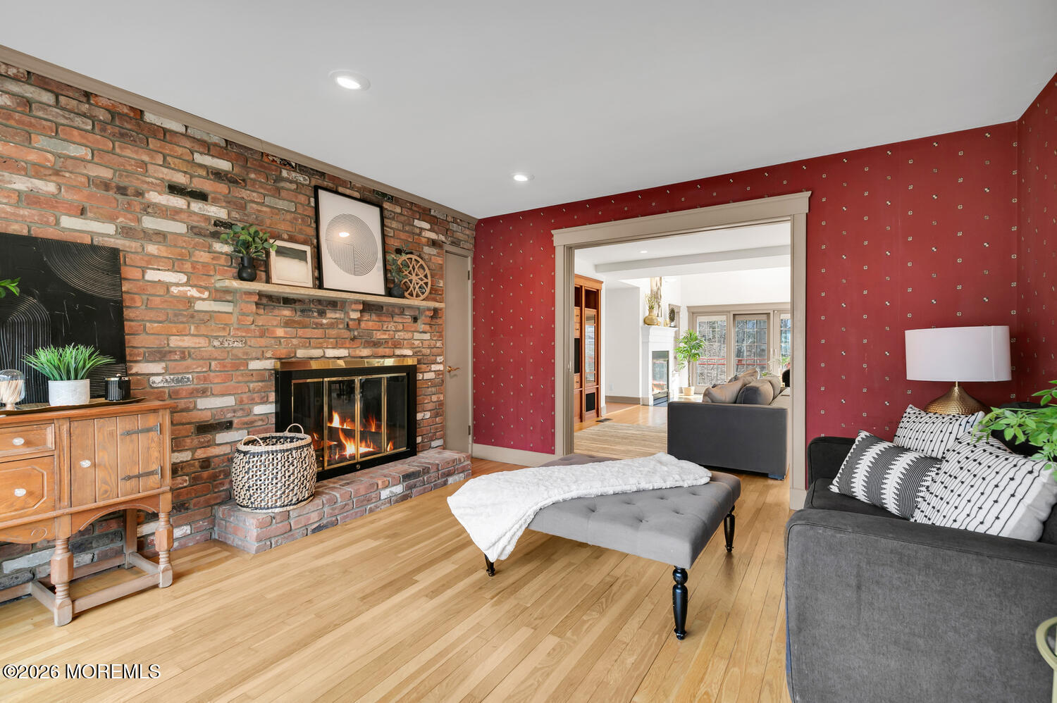 44 Tall Tree Road Middletown, NJ 07748 - Photo 15 of 62 a living room with furniture and a fireplace
