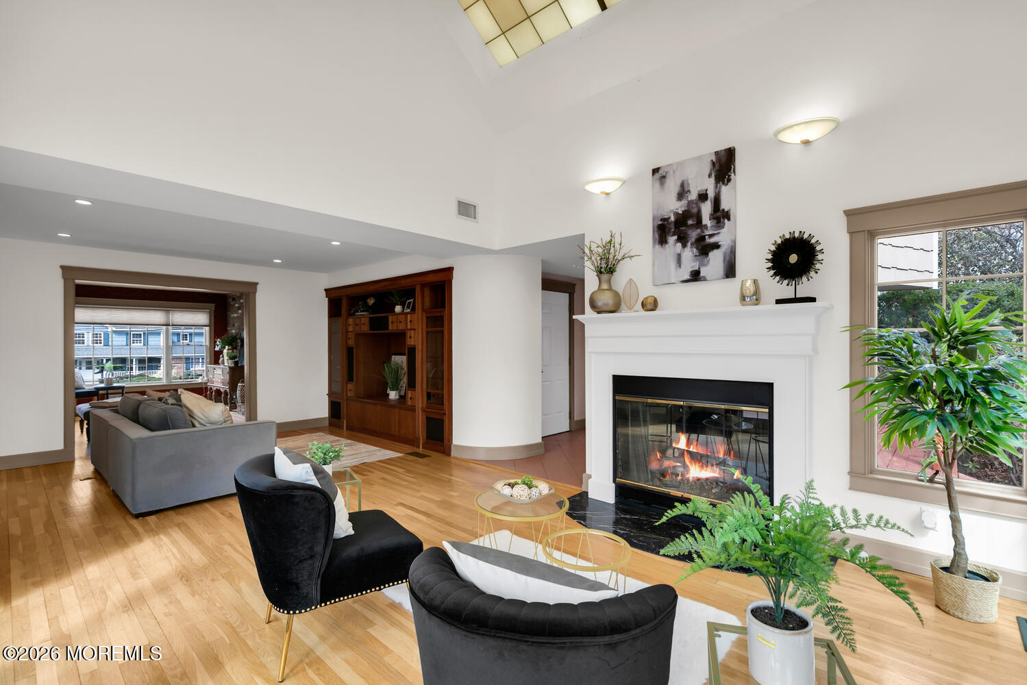 44 Tall Tree Road Middletown, NJ 07748 - Photo 18 of 62 a living room with furniture and a fireplace