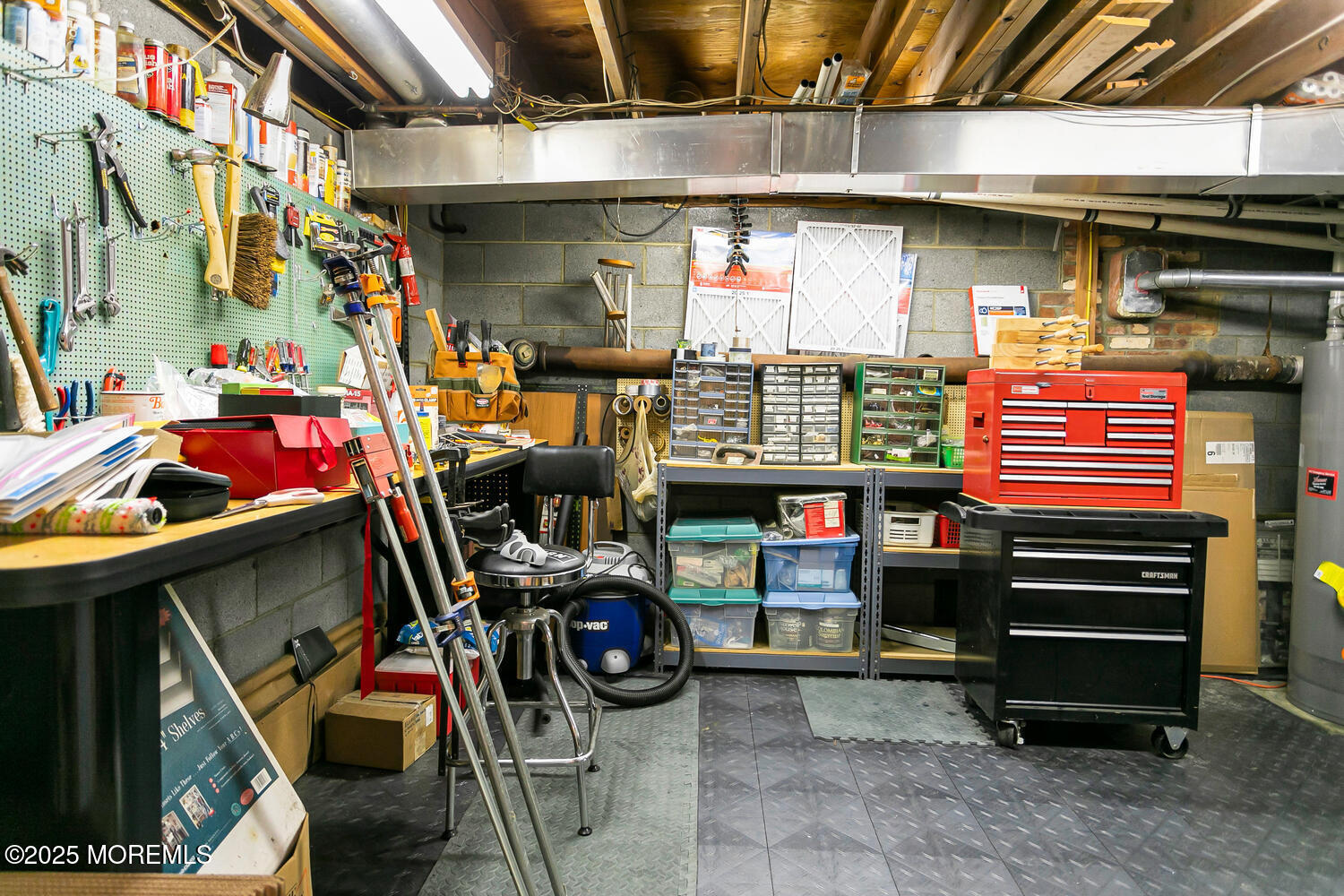 44 Tall Tree Road Middletown, NJ 07748 - Photo 3 of 62 a room with furniture and storage