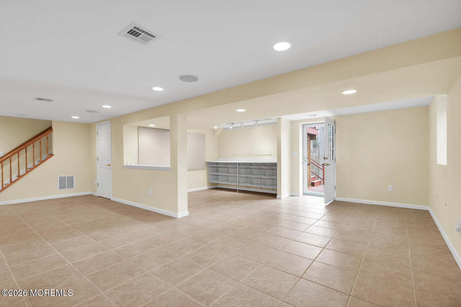 44 Tall Tree Road Middletown, NJ 07748 - Photo 40 of 62 a view of an empty room with a kitchen