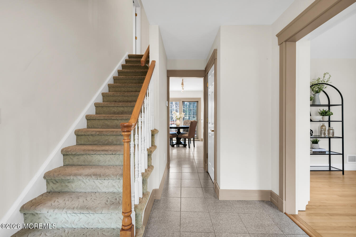 44 Tall Tree Road Middletown, NJ 07748 - Photo 44 of 62 a view of a hallway with wooden floor and entryway
