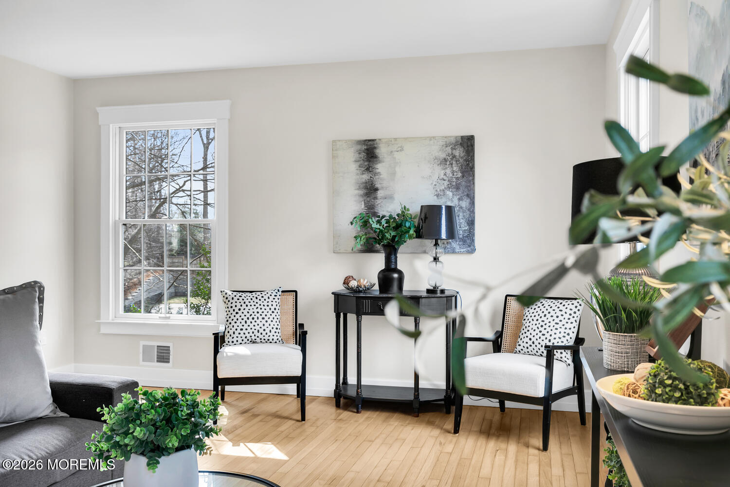 44 Tall Tree Road Middletown, NJ 07748 - Photo 47 of 62 a living room with furniture and a potted plant