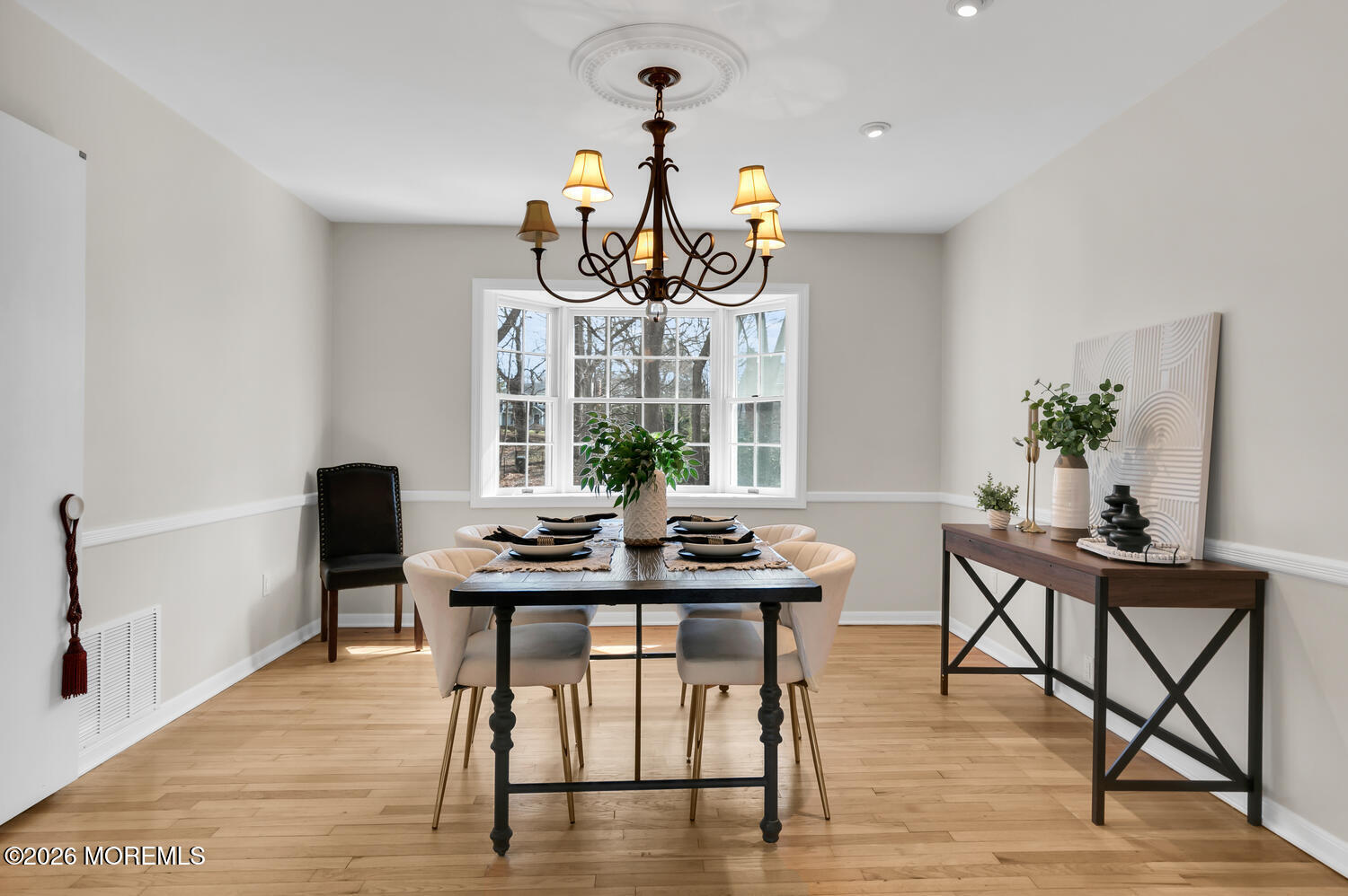 44 Tall Tree Road Middletown, NJ 07748 - Photo 49 of 62 a view of a dining room with furniture window and wooden floor