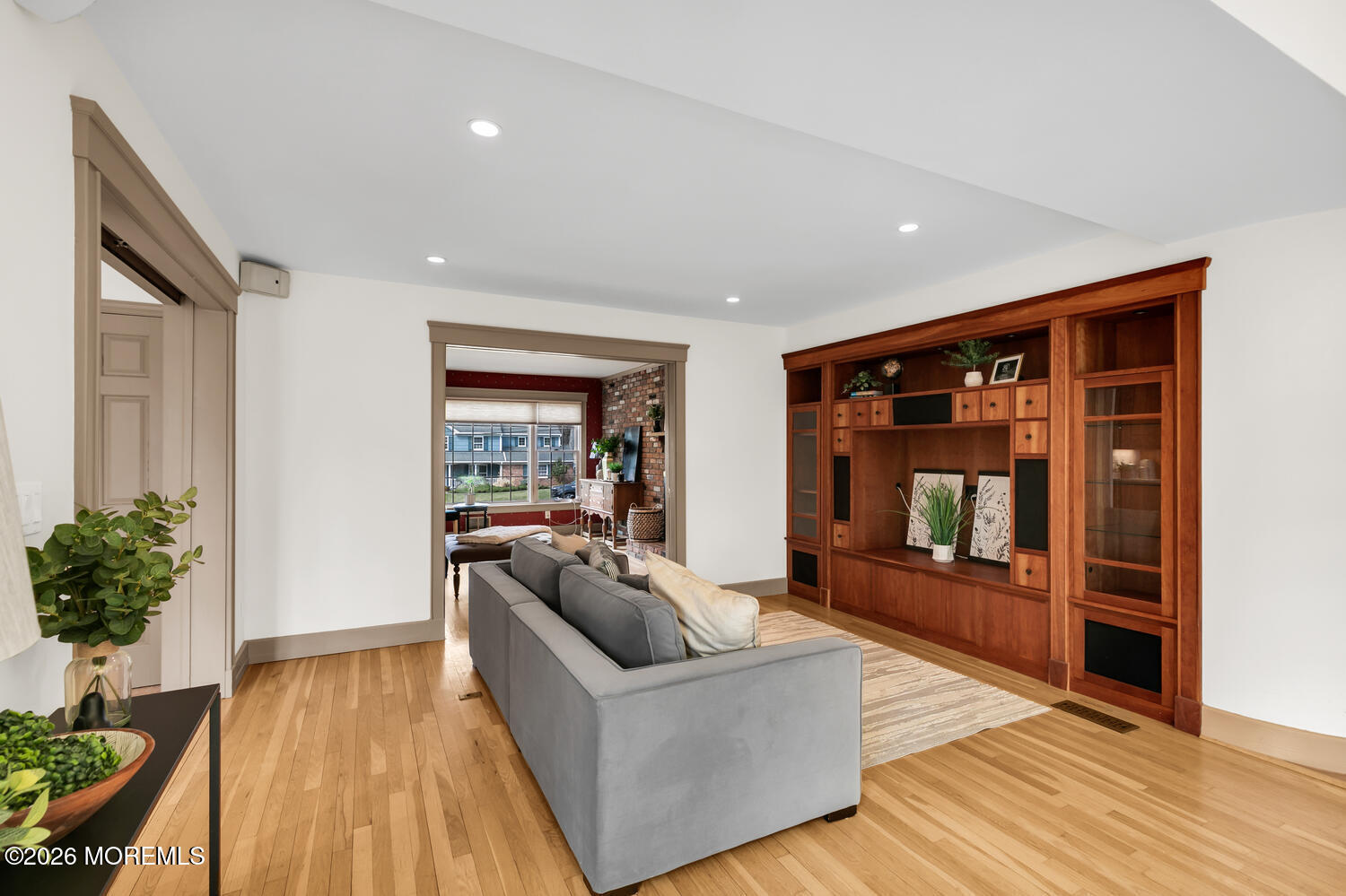 44 Tall Tree Road Middletown, NJ 07748 - Photo 59 of 62 a living room with furniture and a potted plant