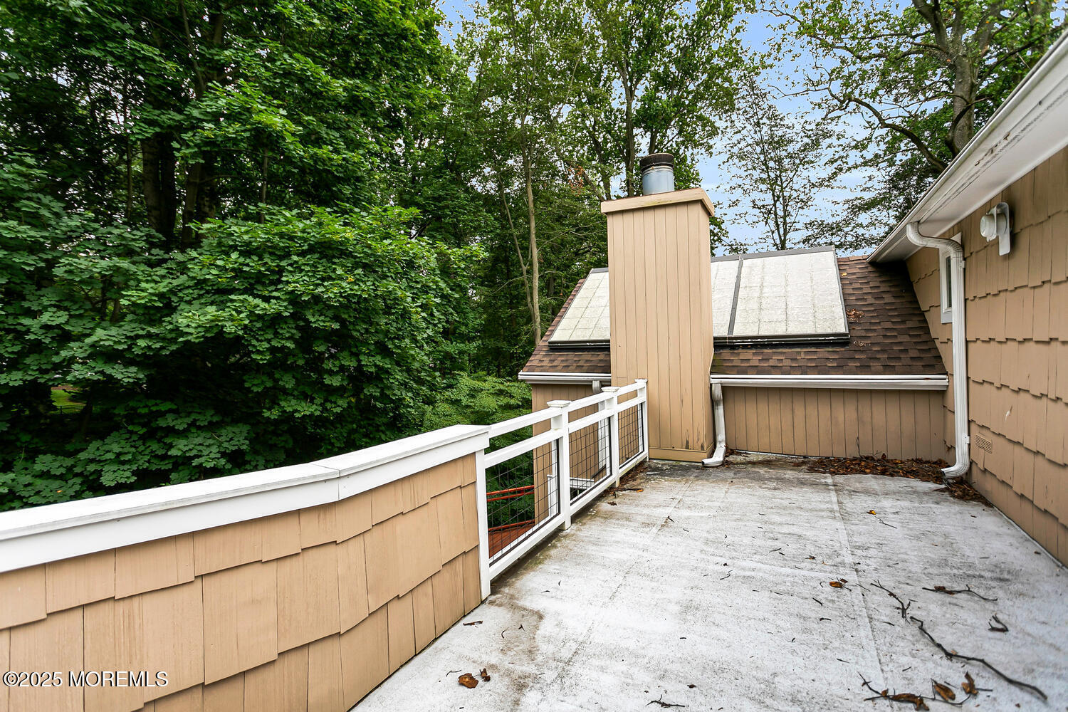 44 Tall Tree Road Middletown, NJ 07748 - Photo 60 of 62 a view of a white house with a outdoor space