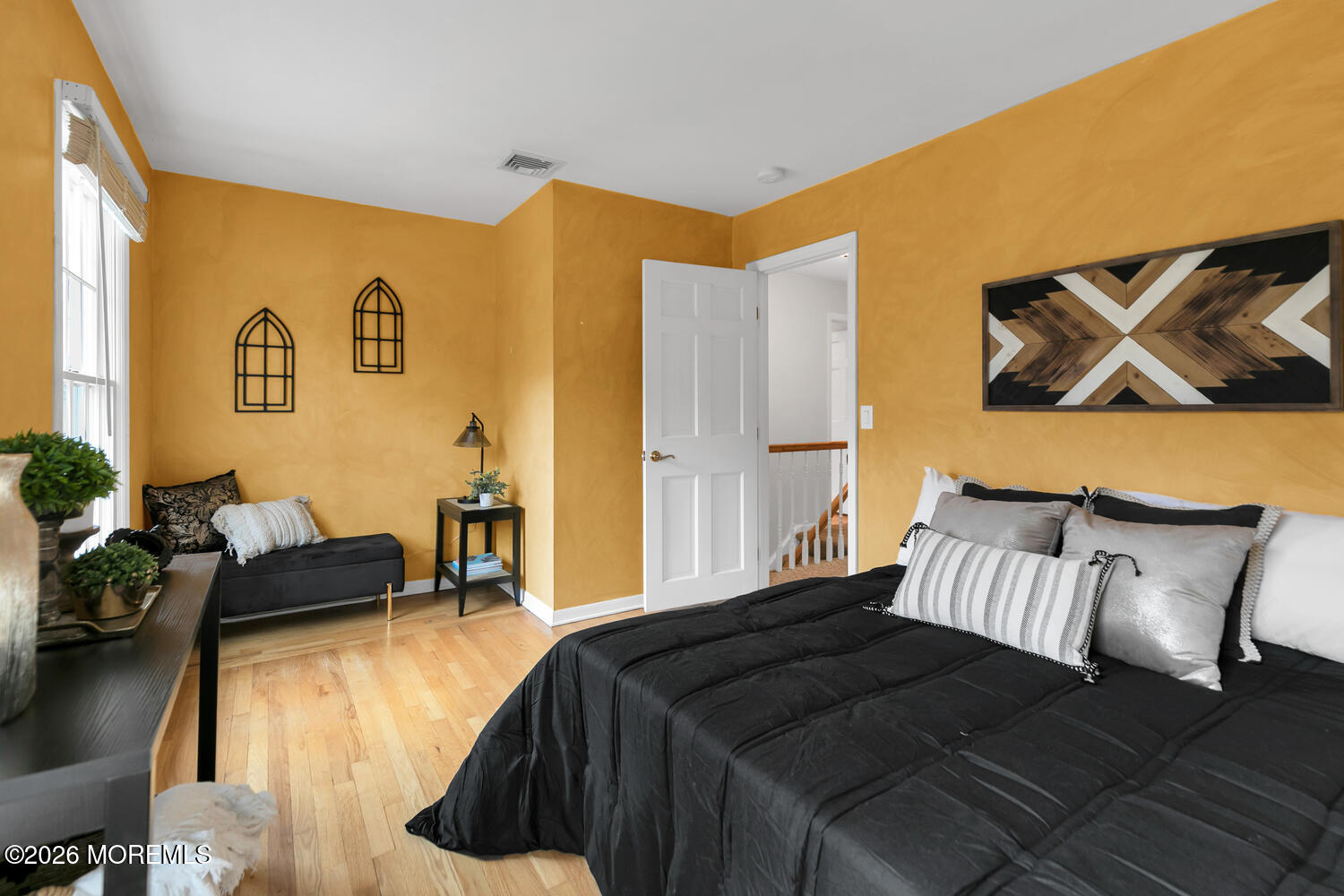 44 Tall Tree Road Middletown, NJ 07748 - Photo 62 of 62 a bedroom with a bed and a couch