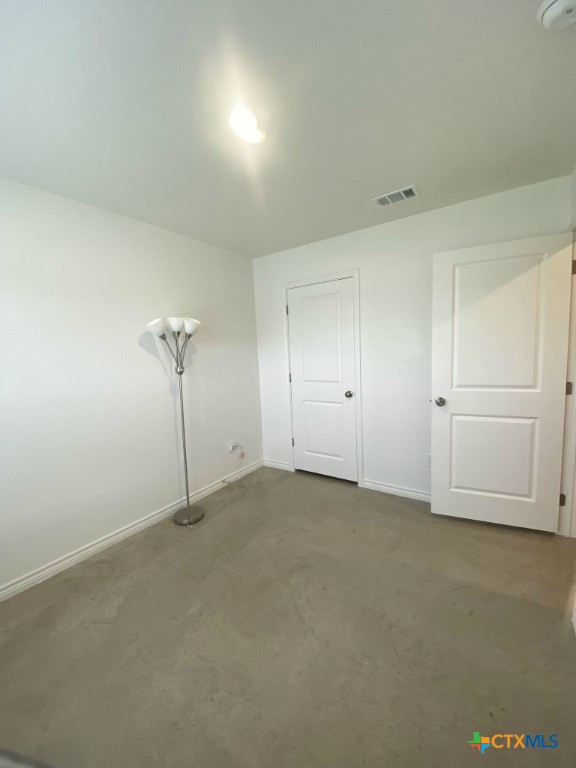 1214 Lehmann Drive, Unit A Copperas Cove, TX 76522 - Photo 20 of 24 an empty room with chandelier fan