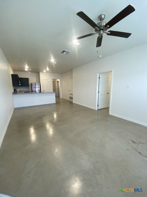 1214 Lehmann Drive, Unit A Copperas Cove, TX 76522 - Photo 2 of 24 an empty room with windows and fan