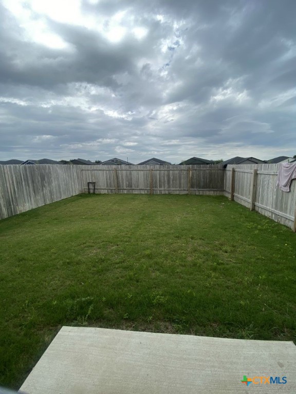 1214 Lehmann Drive, Unit A Copperas Cove, TX 76522 - Photo 23 of 24 a view of a backyard with a garden