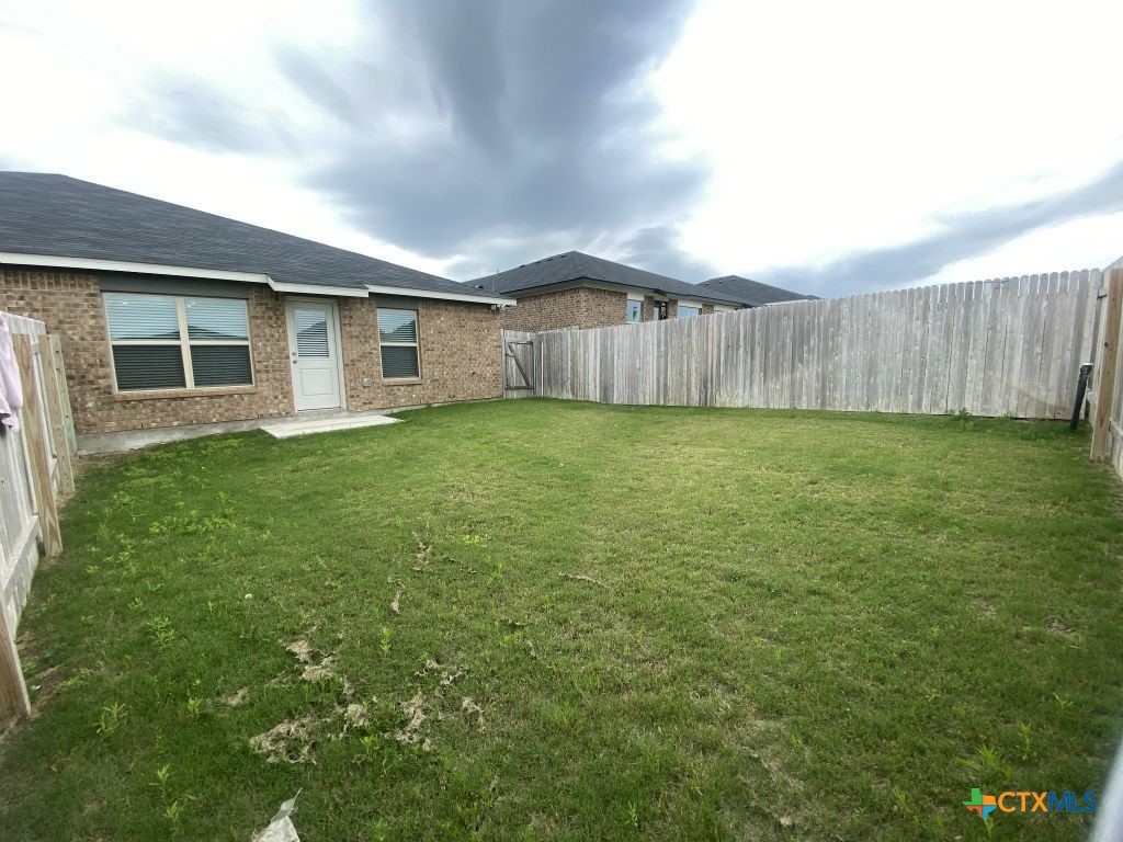 1214 Lehmann Drive, Unit A Copperas Cove, TX 76522 - Photo 24 of 24 a view of a backyard with a garden