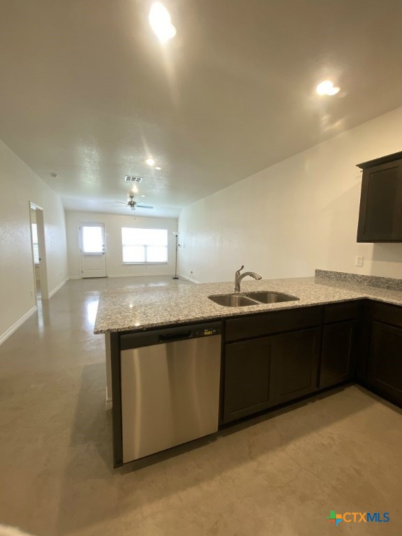 1214 Lehmann Drive, Unit A Copperas Cove, TX 76522 - Photo 8 of 24 a kitchen with kitchen island sink and faucet