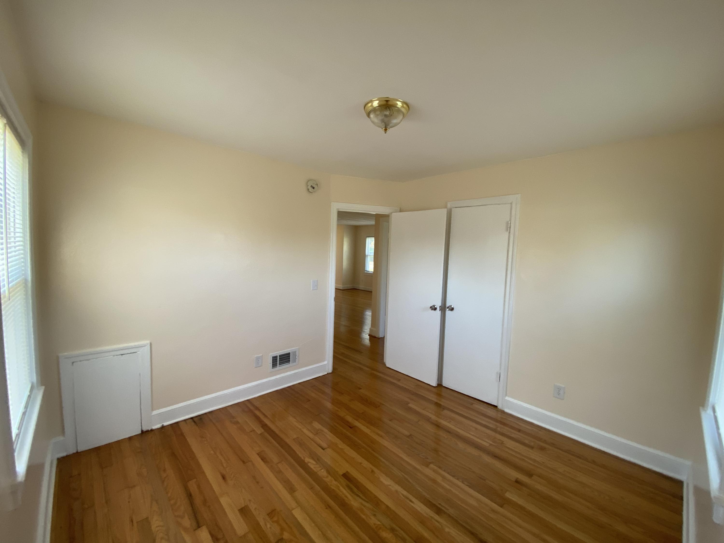3731 Cove Road Roanoke, VA 24017 - Photo 18 of 25 a view of empty room with wooden floor