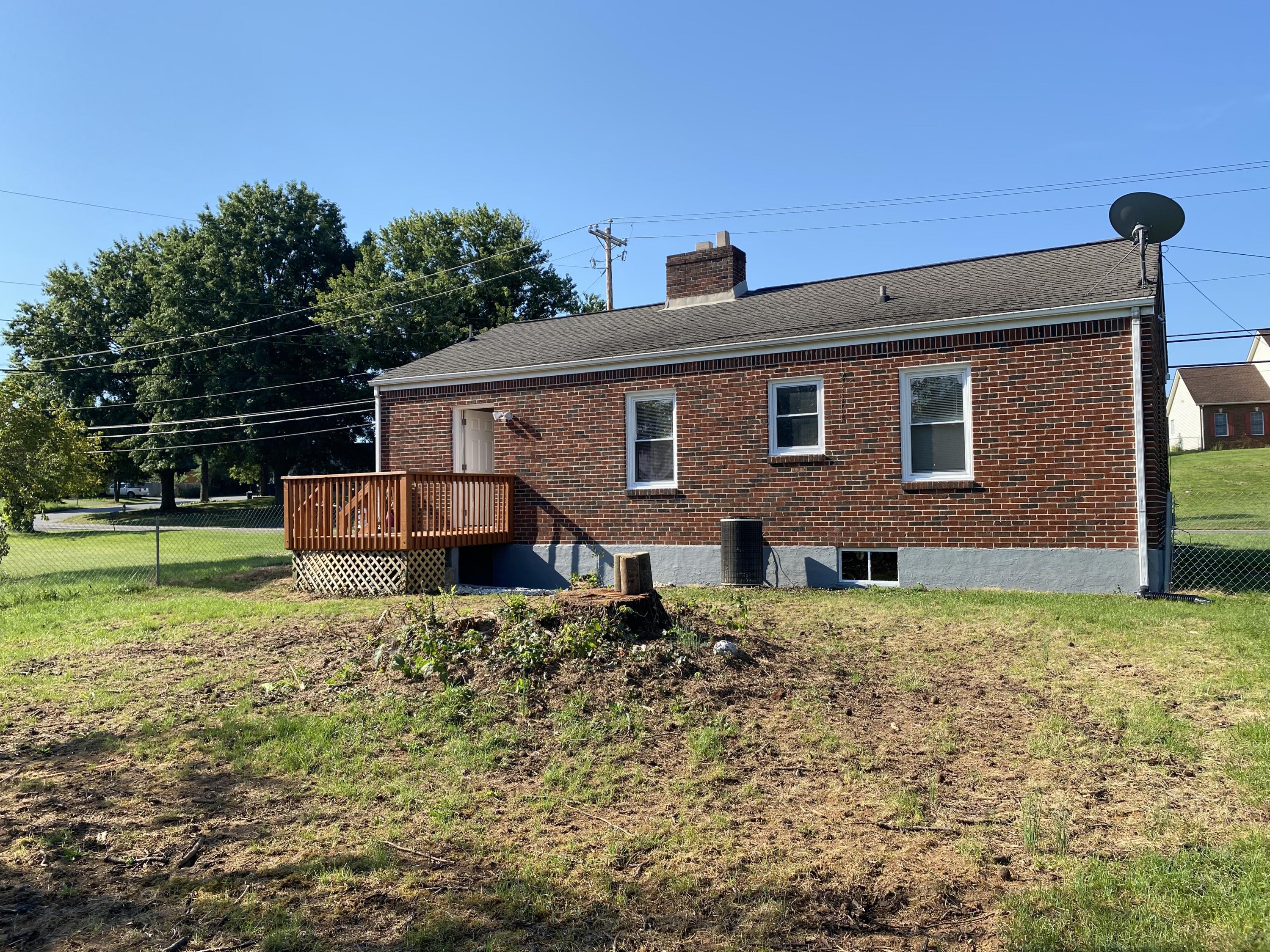 3731 Cove Road Roanoke, VA 24017 - Photo 25 of 25 a backyard of a house with wooden fence