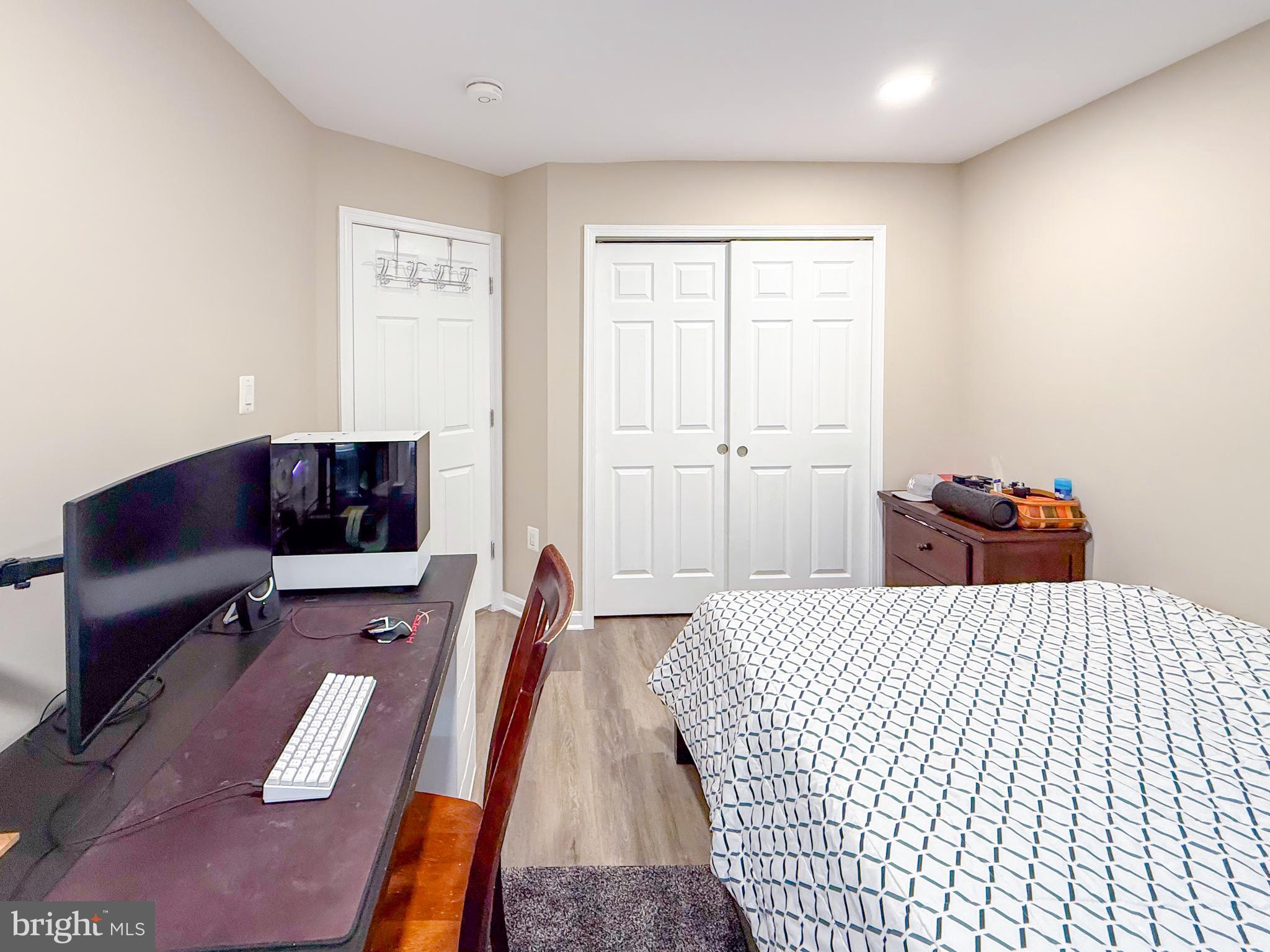 42258 Dean Chapel Square Chantilly, VA 20152 - Photo 19 of 35 a bedroom with a bed and a couch