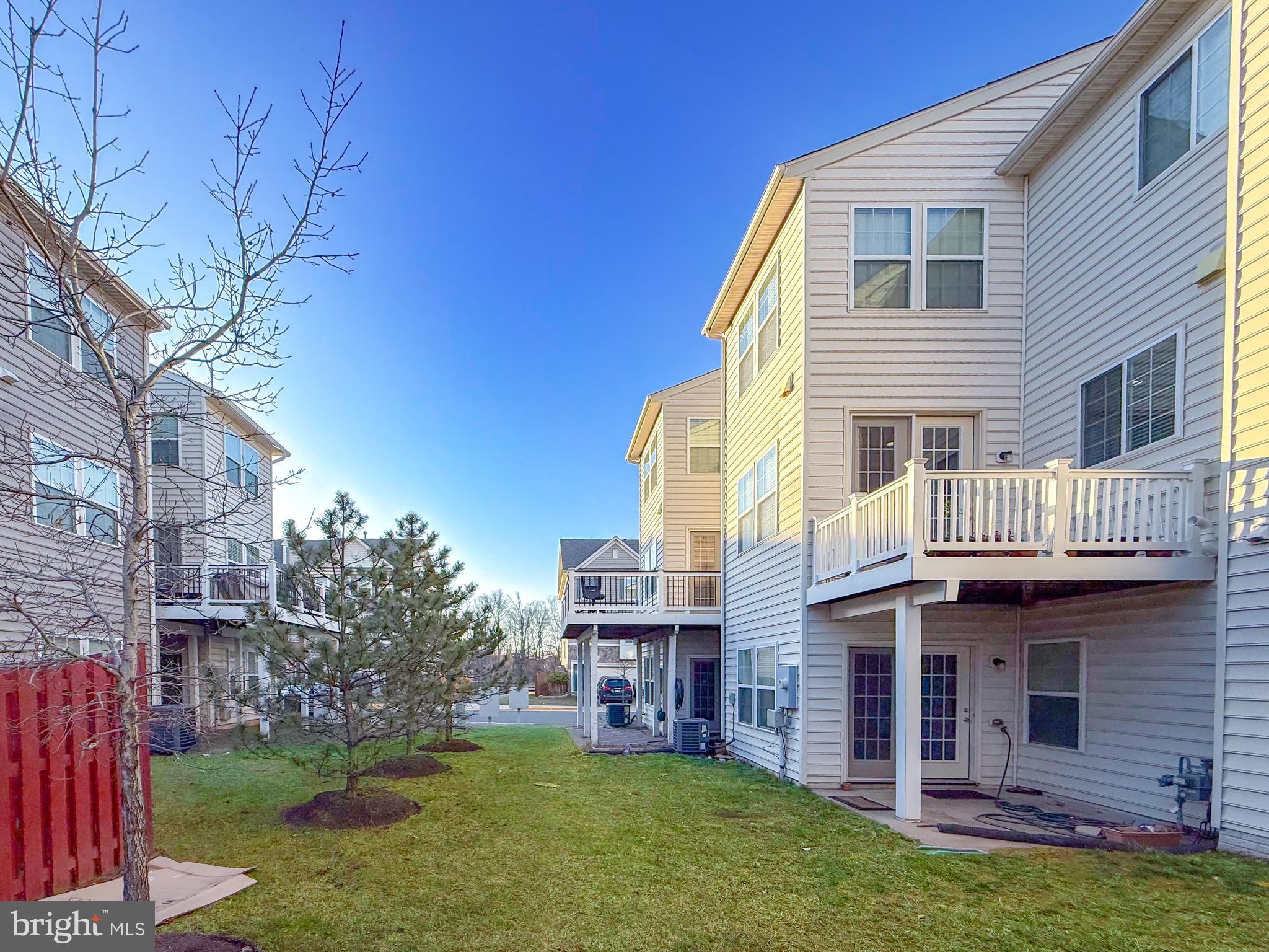 42258 Dean Chapel Square Chantilly, VA 20152 - Photo 30 of 35 a view of a house with a yard