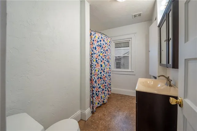 a room with furniture and window