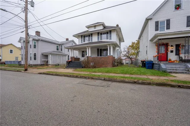 a view of a street with houses