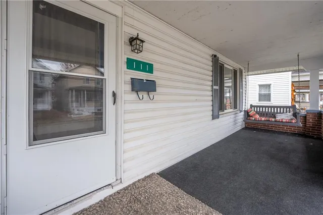 a view of a porch of a house
