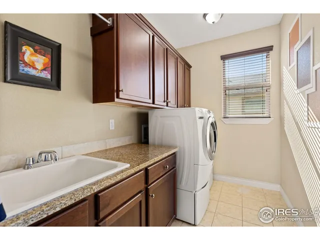 a bedroom with a bed and a mirror