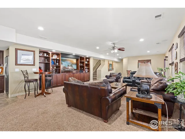 a kitchen with a table and chairs